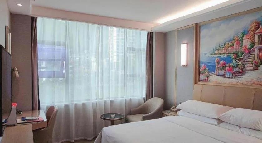 Bed in Vienna Hotel Guangxi Hechi Jinchengjiang Baima Street