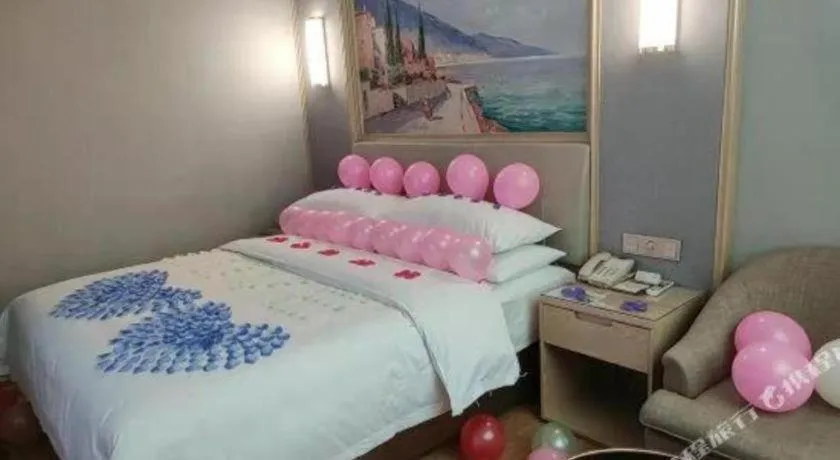 Bed in Vienna Hotel Guangxi Hechi Jinchengjiang Baima Street