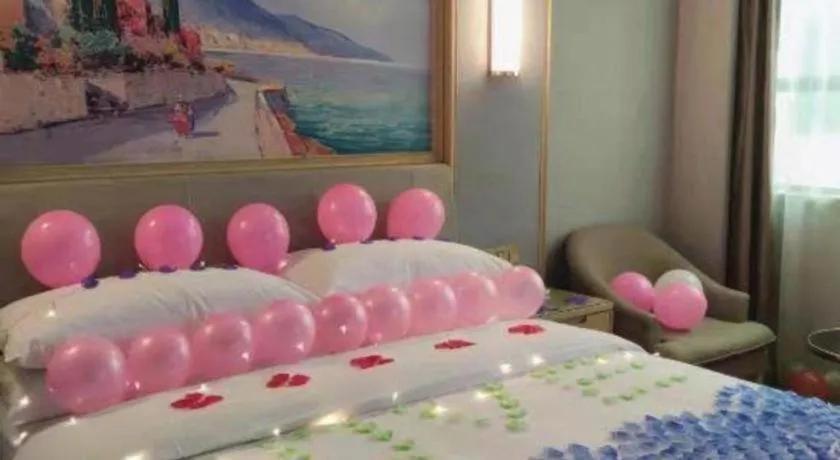 Bed in Vienna Hotel Guangxi Hechi Jinchengjiang Baima Street