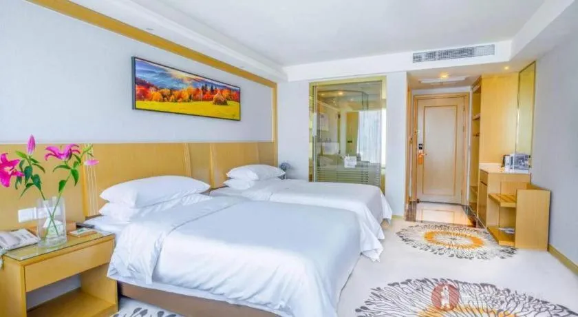 Bed in Vienna Hotel Guangzhou Huadu Financial Center Sunac Amusement Park