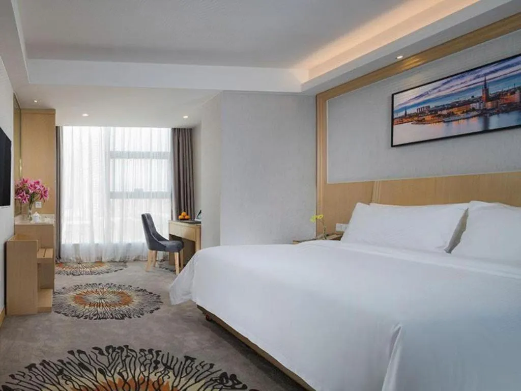 Bed in Vienna Hotel Guangzhou Huadu Financial Center Sunac Amusement Park