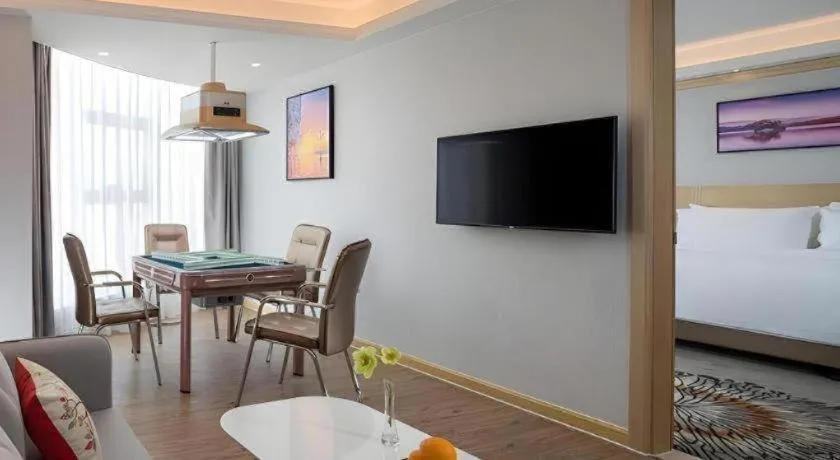 Bed in Vienna Hotel Guangzhou Huadu Financial Center Sunac Amusement Park