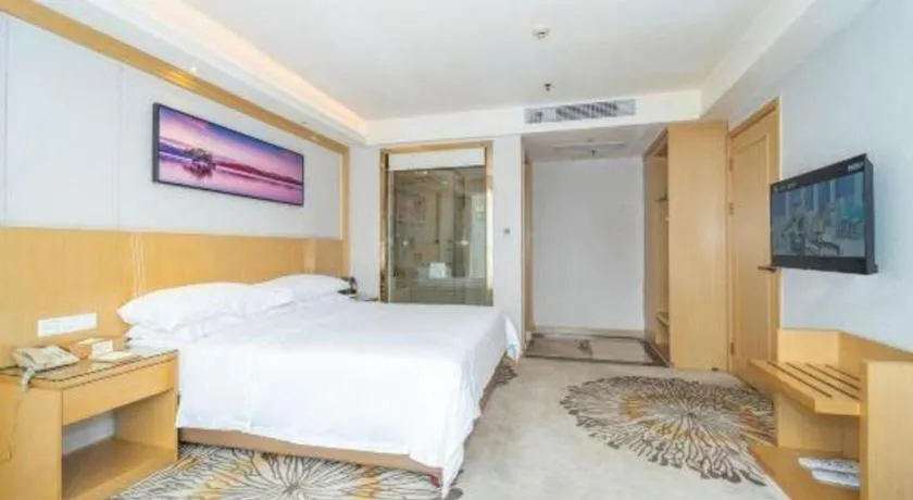 Bed in Vienna Hotel Guangzhou Huadu Financial Center Sunac Amusement Park