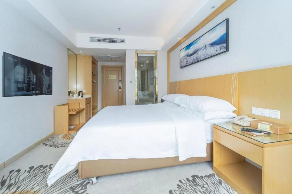 Bed in Vienna Hotel Guangzhou Huadu Financial Center Sunac Amusement Park