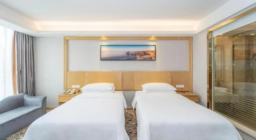 Bed in Vienna Hotel Guangzhou Huadu Financial Center Sunac Amusement Park
