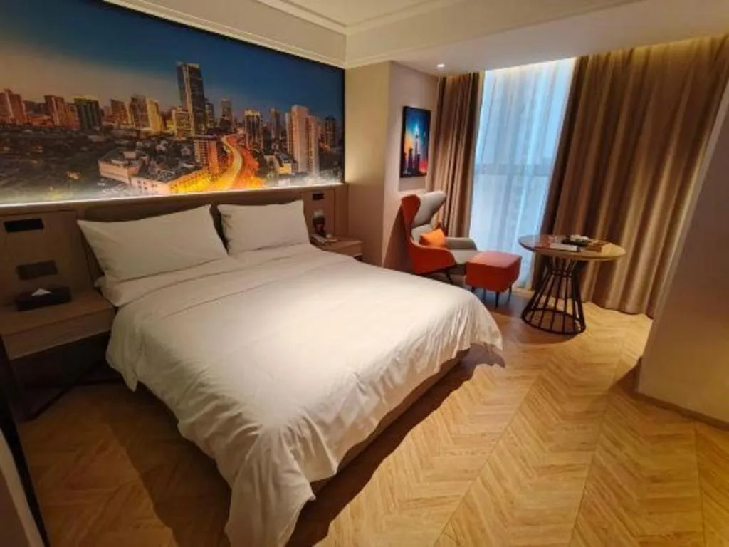 Bed in Vienna Hotel Guangzhou Huadu Financial Center Sunac Amusement Park