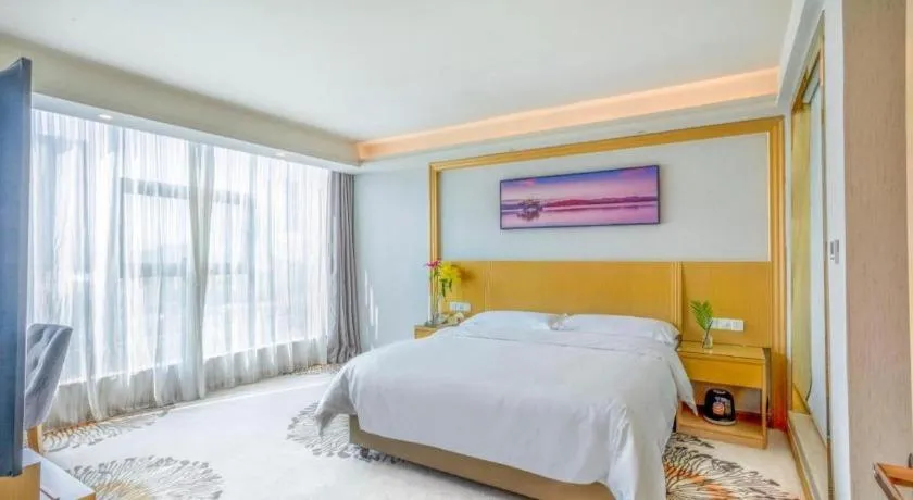 Bed in Vienna Hotel Guangzhou Huadu Financial Center Sunac Amusement Park