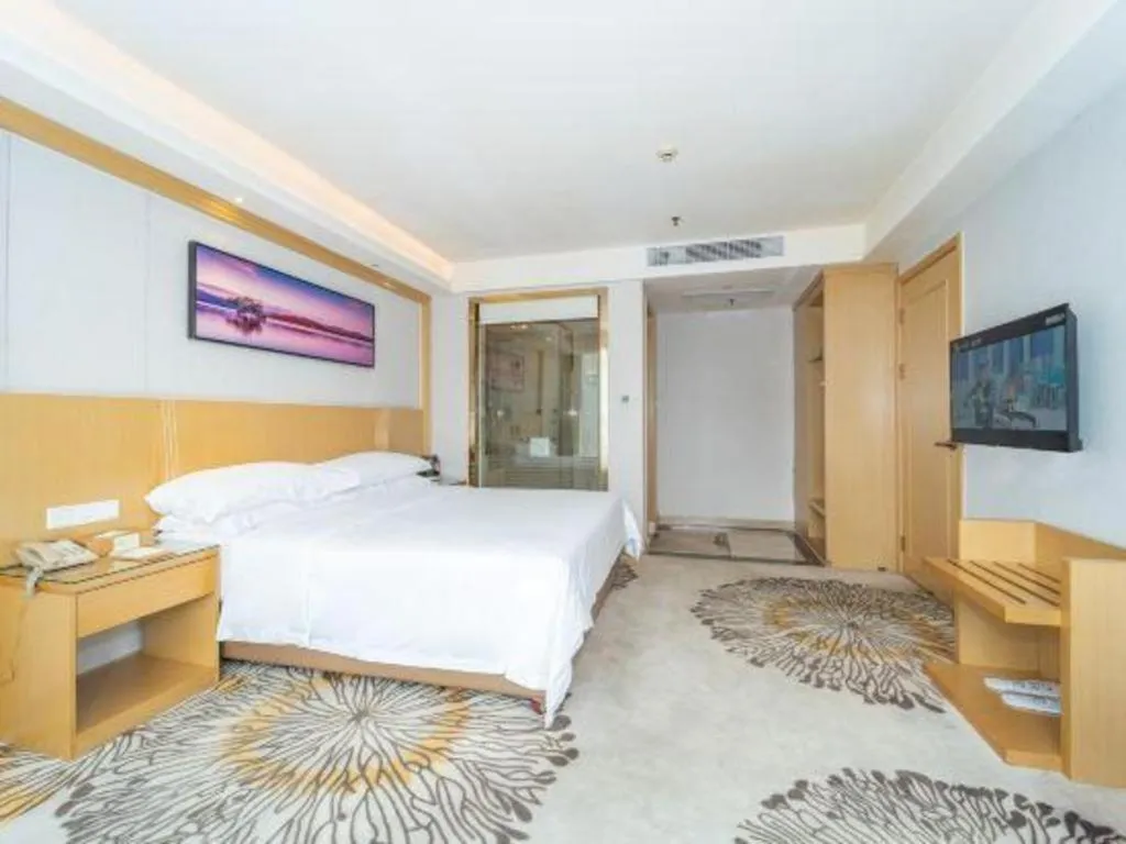 Bed in Vienna Hotel Guangzhou Huadu Financial Center Sunac Amusement Park