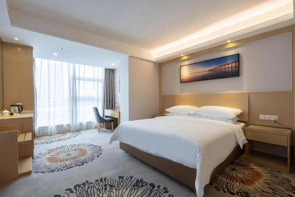 Bed in Vienna Hotel Guangzhou Huadu Financial Center Sunac Amusement Park