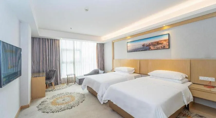 Bed in Vienna Hotel Guangzhou Huadu Financial Center Sunac Amusement Park