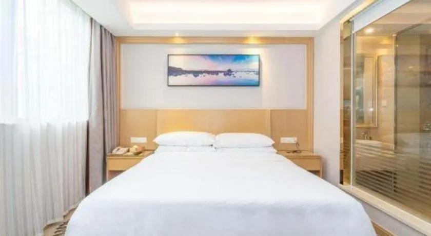 Bed in Vienna Hotel Guangzhou Huadu Financial Center Sunac Amusement Park