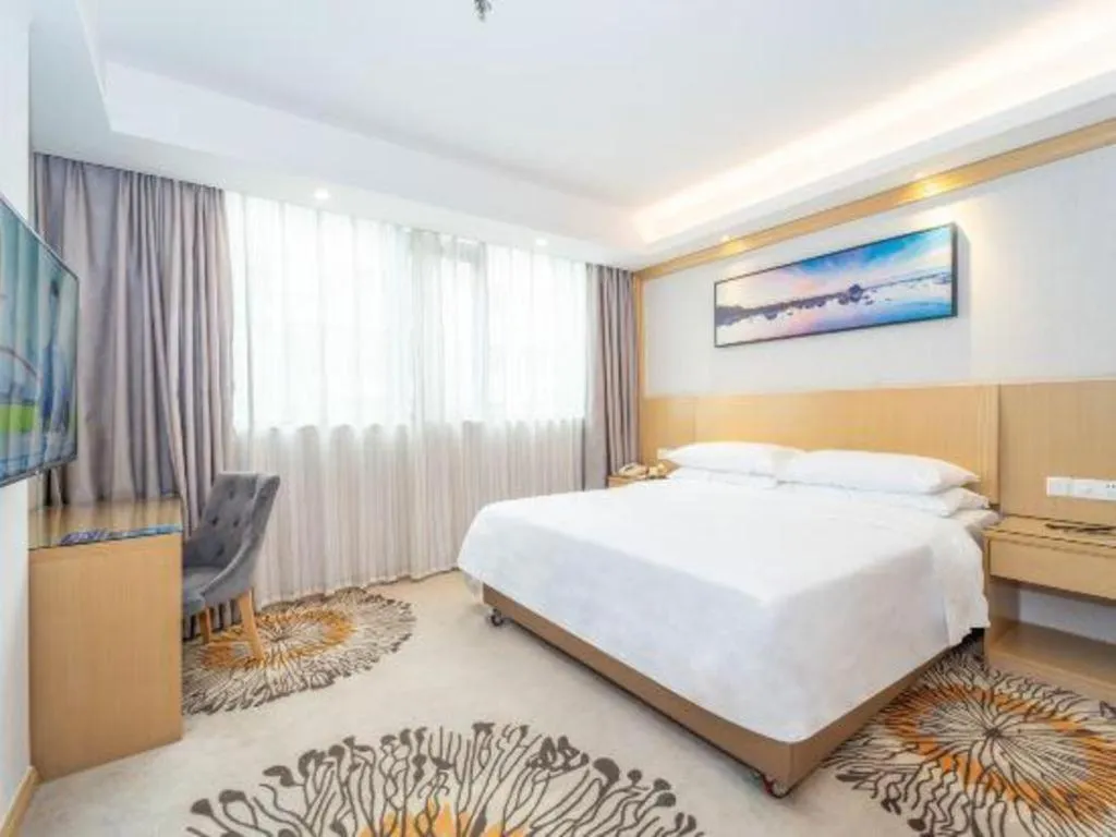 Bed in Vienna Hotel Guangzhou Huadu Financial Center Sunac Amusement Park