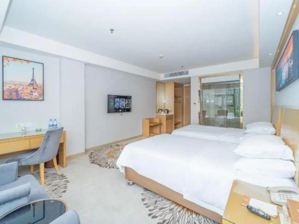 Bed in Vienna Hotel Guangzhou Huadu Financial Center Sunac Amusement Park