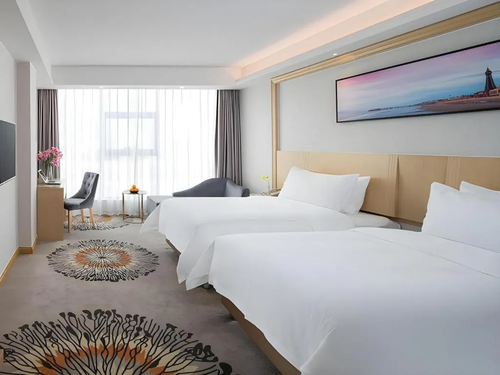 Bed in Vienna Hotel Guangzhou Huadu Financial Center Sunac Amusement Park