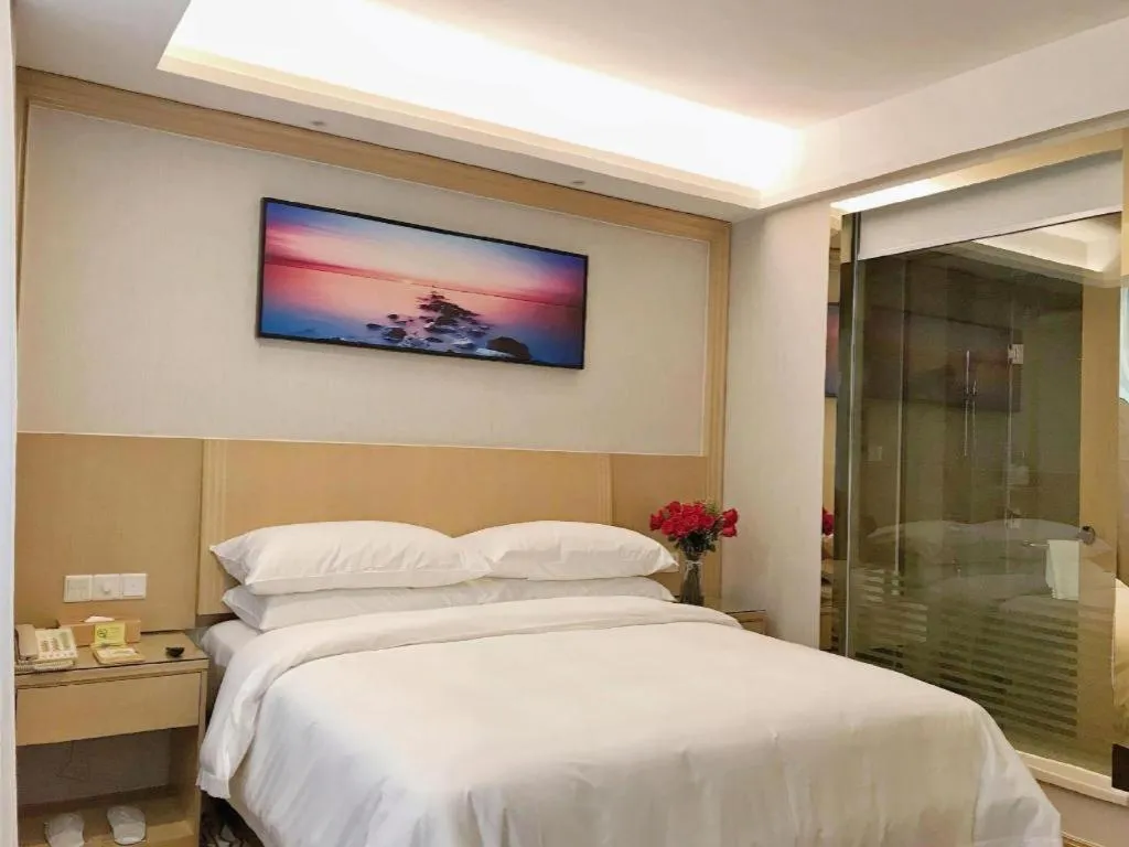 Bed in Vienna Hotel Guangzhou Huadu Financial Center Sunac Amusement Park