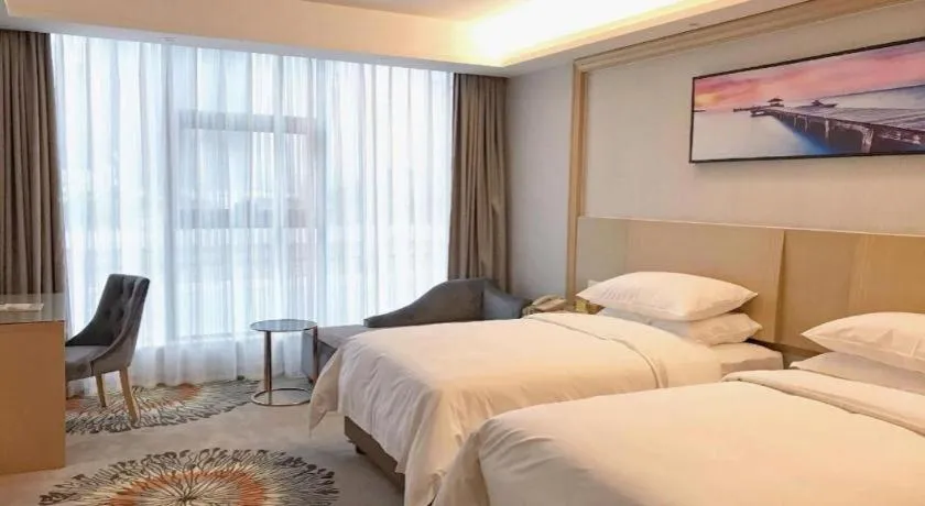 Bed in Vienna Hotel Guangzhou Huadu Financial Center Sunac Amusement Park