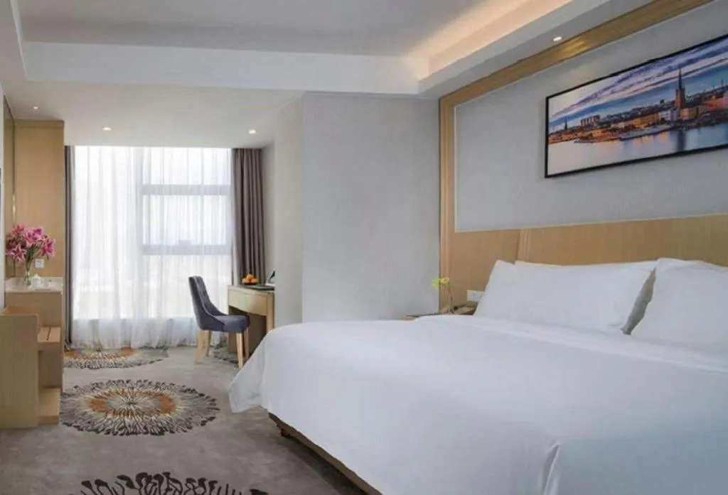 Bed in Vienna Hotel Guangzhou Huadu Financial Center Sunac Amusement Park