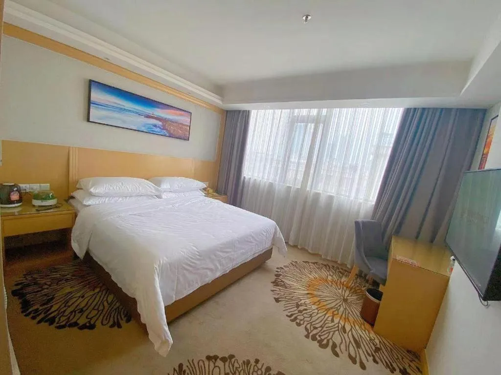 Bed in Vienna Hotel Guangzhou Huadu Financial Center Sunac Amusement Park