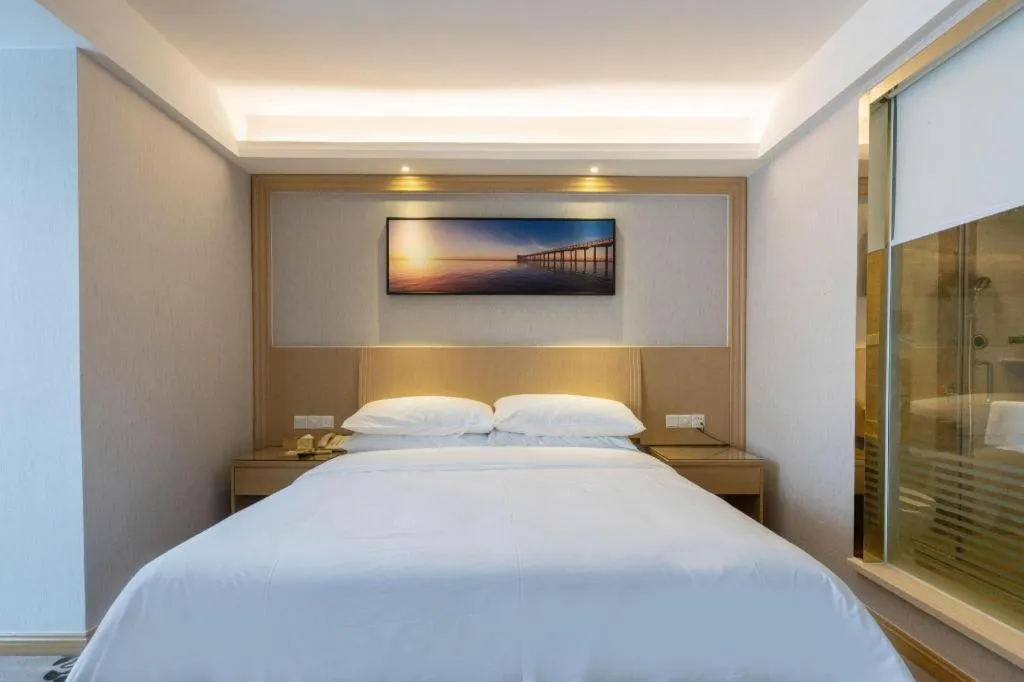 Bed in Vienna Hotel Guangzhou Huadu Financial Center Sunac Amusement Park