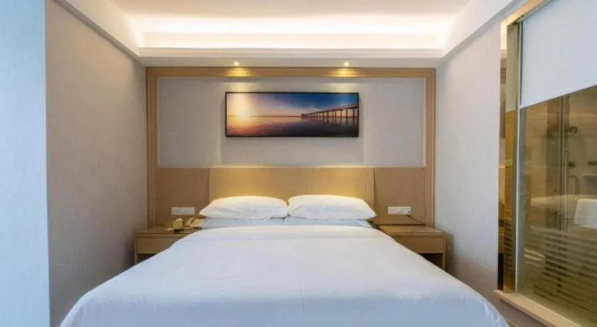 Bed in Vienna Hotel Guangzhou Huadu Financial Center Sunac Amusement Park