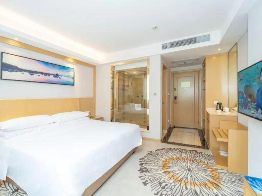 Bed in Vienna Hotel Guangzhou Huadu Financial Center Sunac Amusement Park