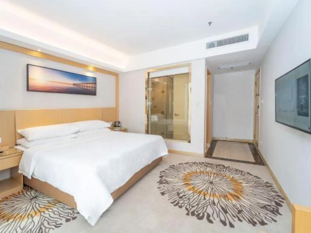 Bed in Vienna Hotel Guangzhou Huadu Financial Center Sunac Amusement Park