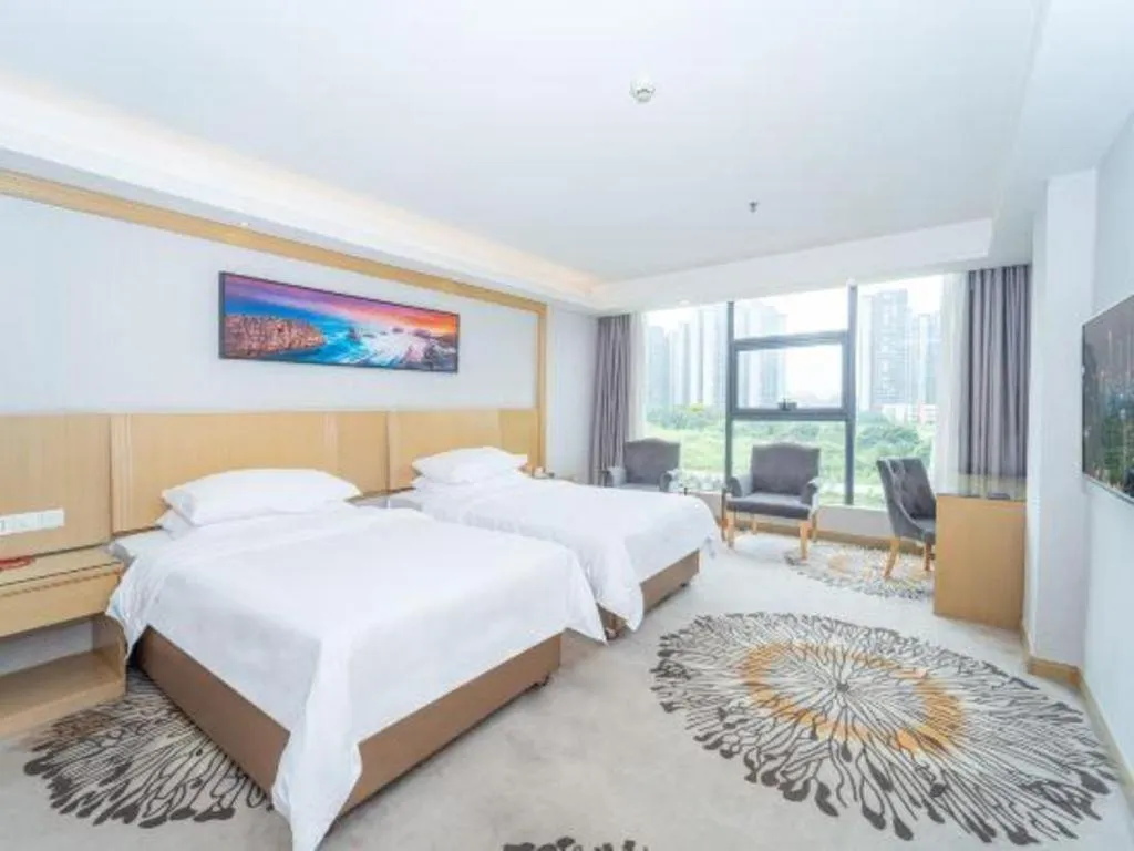 Bed in Vienna Hotel Guangzhou Huadu Financial Center Sunac Amusement Park