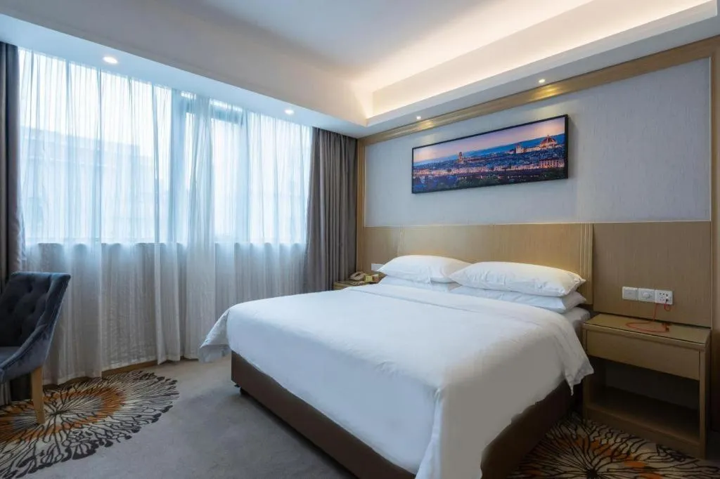 Bed in Vienna Hotel Guangzhou Huadu Financial Center Sunac Amusement Park