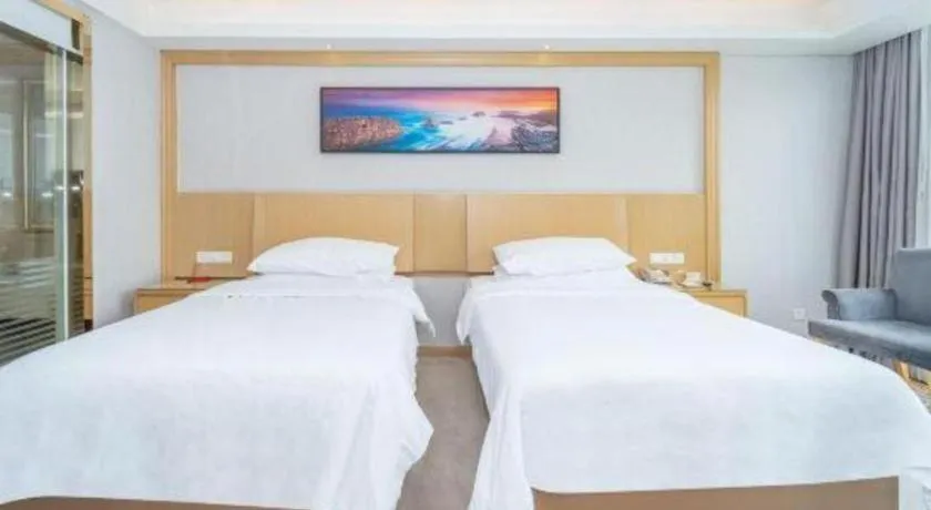Bed in Vienna Hotel Guangzhou Huadu Financial Center Sunac Amusement Park