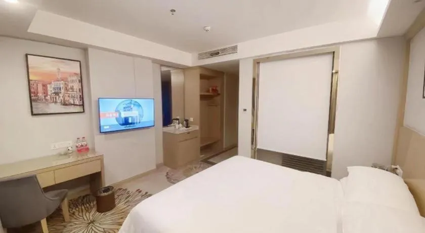Bed in Vienna Hotel Guangzhou Huadu Financial Center Sunac Amusement Park