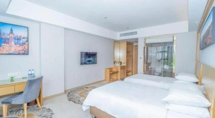 Bed in Vienna Hotel Guangzhou Huadu Financial Center Sunac Amusement Park