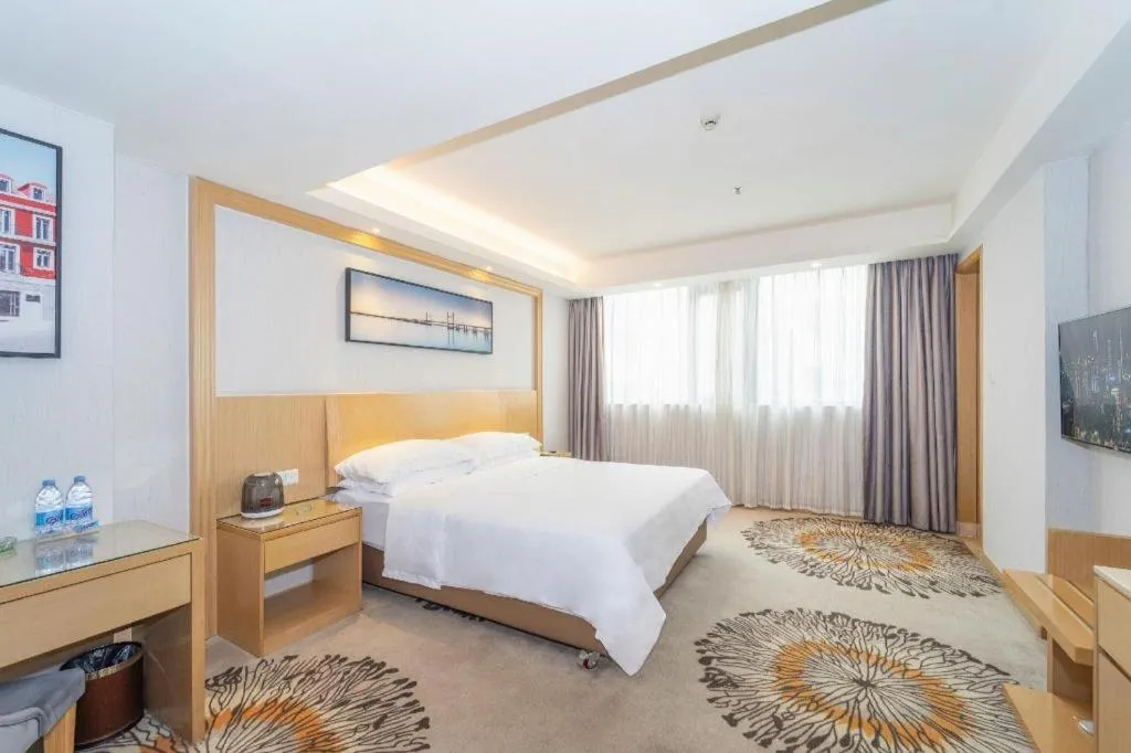 Bed in Vienna Hotel Guangzhou Huadu Financial Center Sunac Amusement Park