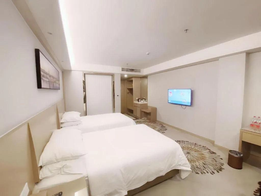 Bed in Vienna Hotel Guangzhou Huadu Financial Center Sunac Amusement Park