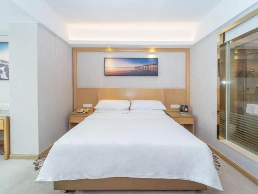 Bed in Vienna Hotel Guangzhou Huadu Financial Center Sunac Amusement Park