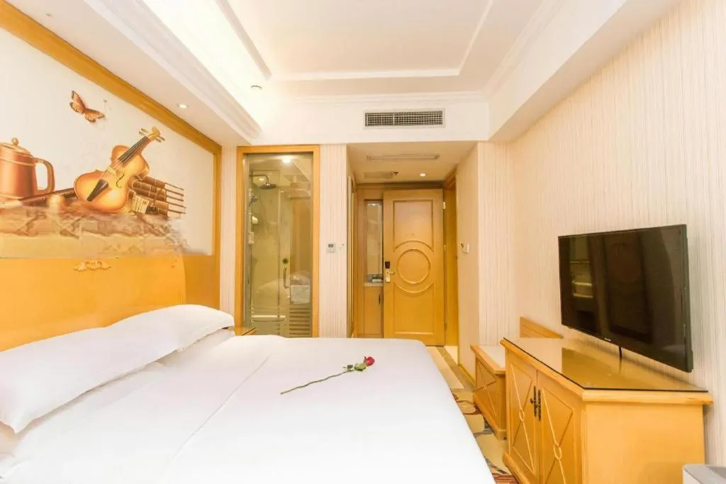 Bed in Vienna Hotel Jiangsu Kunshan Changjiang North Road Fenghuangcheng