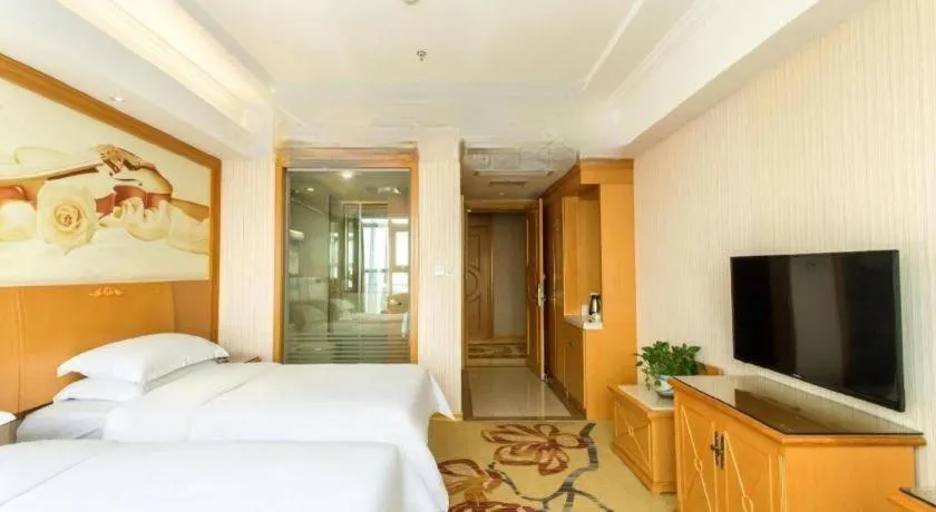 Bed in Vienna Hotel Jiangsu Kunshan Changjiang North Road Fenghuangcheng