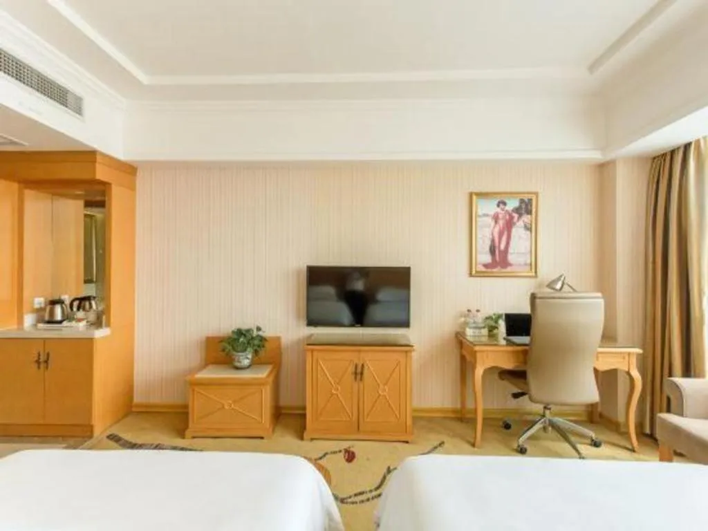 Bed in Vienna Hotel Jiangsu Kunshan Changjiang North Road Fenghuangcheng