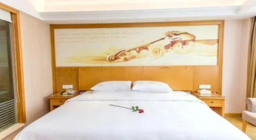 Bed in Vienna Hotel Jiangsu Kunshan Changjiang North Road Fenghuangcheng