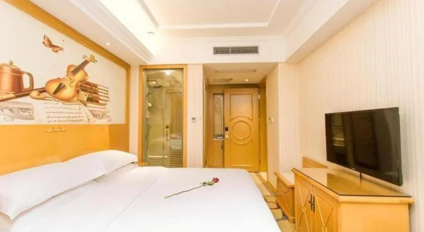 Bed in Vienna Hotel Jiangsu Kunshan Changjiang North Road Fenghuangcheng