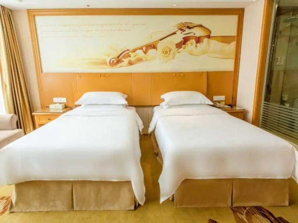 Bed in Vienna Hotel Jiangsu Kunshan Changjiang North Road Fenghuangcheng