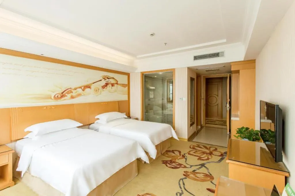 Bed in Vienna Hotel Jiangsu Kunshan Changjiang North Road Fenghuangcheng