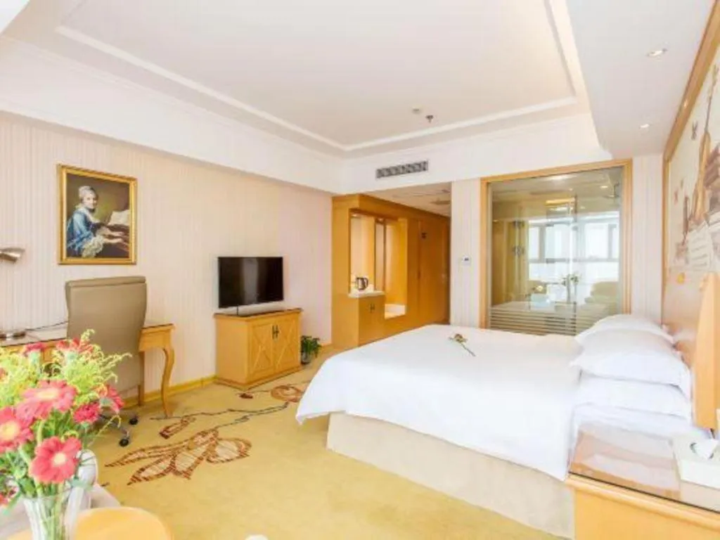 Bed in Vienna Hotel Jiangsu Kunshan Changjiang North Road Fenghuangcheng