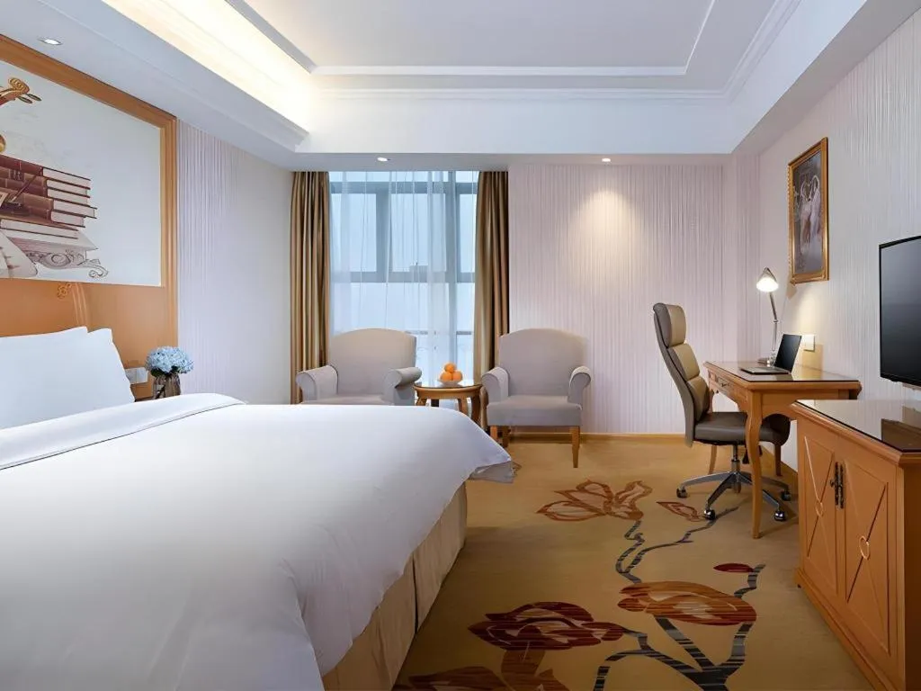 Bed in Vienna Hotel Jiangsu Kunshan Changjiang North Road Fenghuangcheng