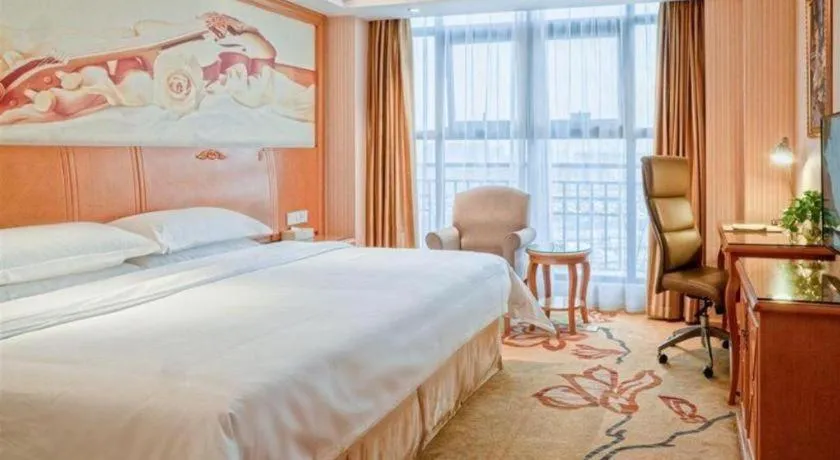 Bed in Vienna Hotel Jiangsu Kunshan Changjiang North Road Fenghuangcheng