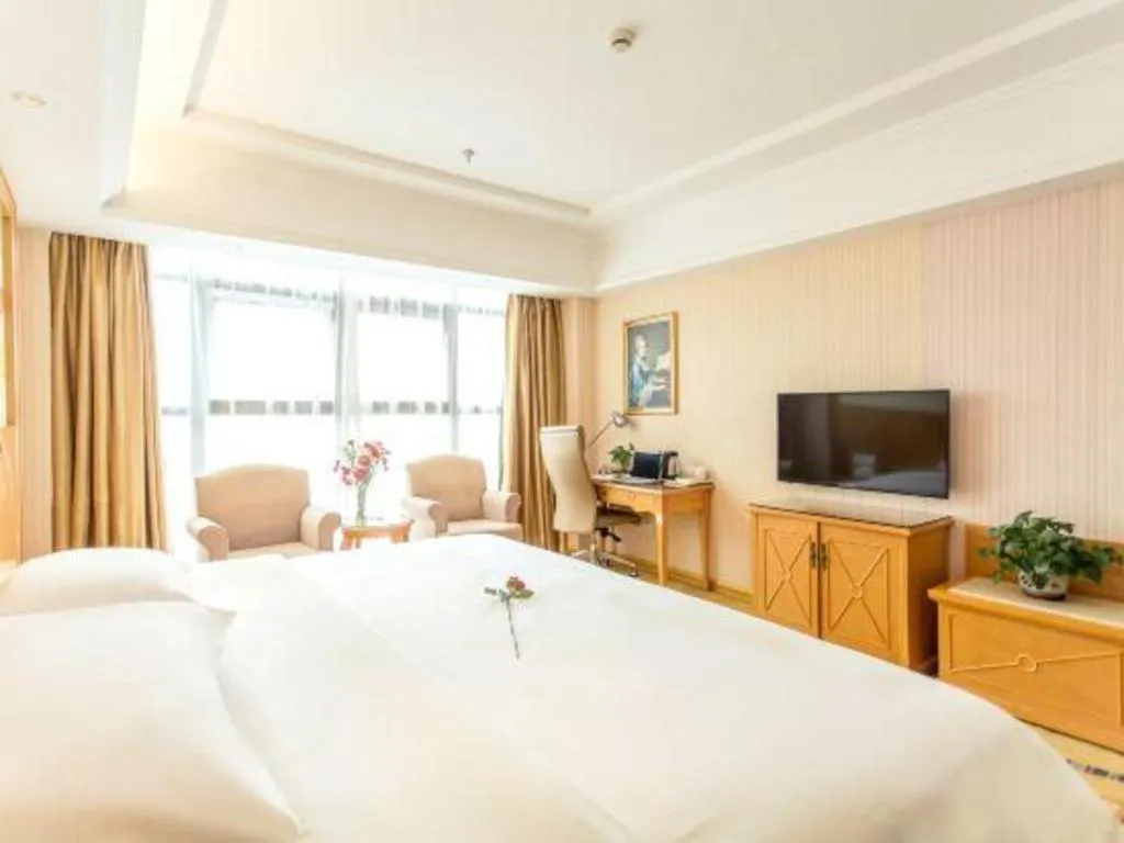 Bed in Vienna Hotel Jiangsu Kunshan Changjiang North Road Fenghuangcheng
