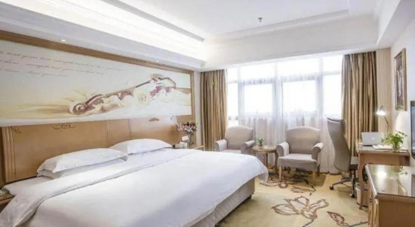 Bed in Vienna Hotel Jiangsu Kunshan Changjiang North Road Fenghuangcheng