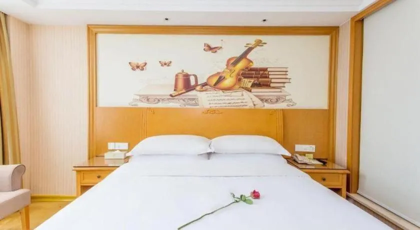 Bed in Vienna Hotel Jiangsu Kunshan Changjiang North Road Fenghuangcheng