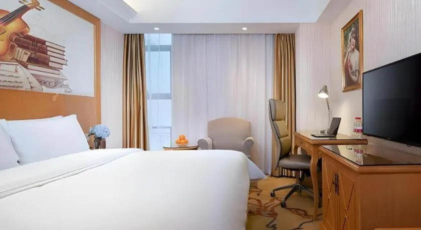 Bed in Vienna Hotel Jiangsu Kunshan Changjiang North Road Fenghuangcheng