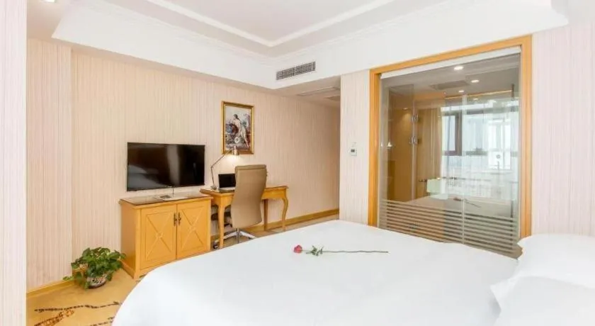 Bed in Vienna Hotel Jiangsu Kunshan Changjiang North Road Fenghuangcheng