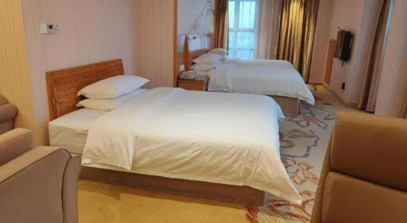 Bed in Vienna Hotel Jiangsu Kunshan Changjiang North Road Fenghuangcheng